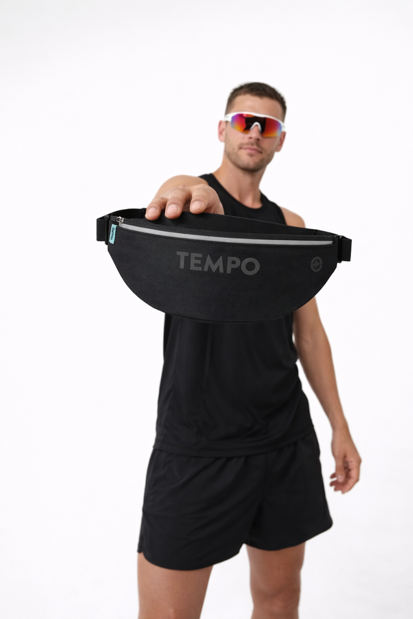 A runner wearing a TEMPO running belt